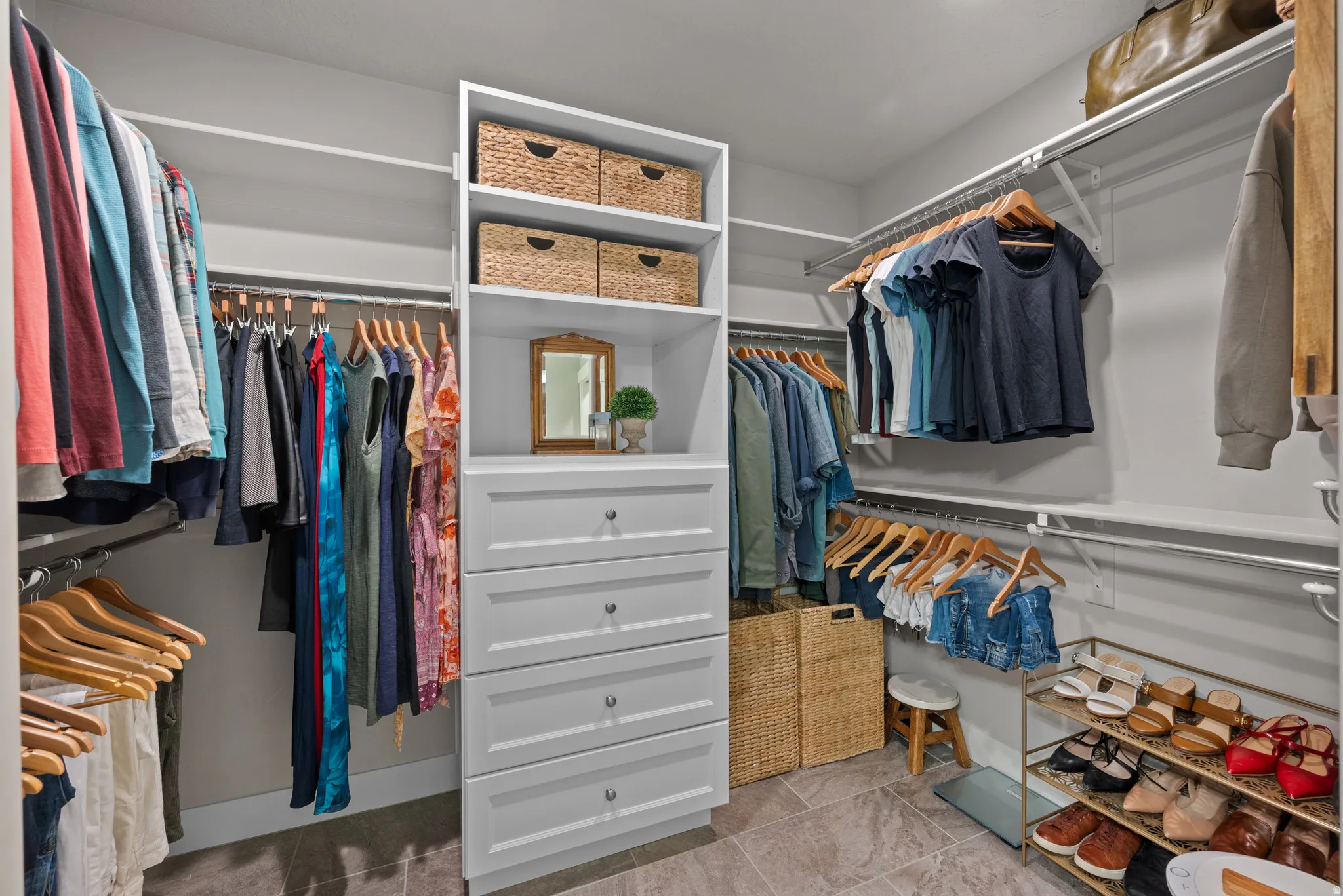 Amazing master walk in closet with custom built in's
