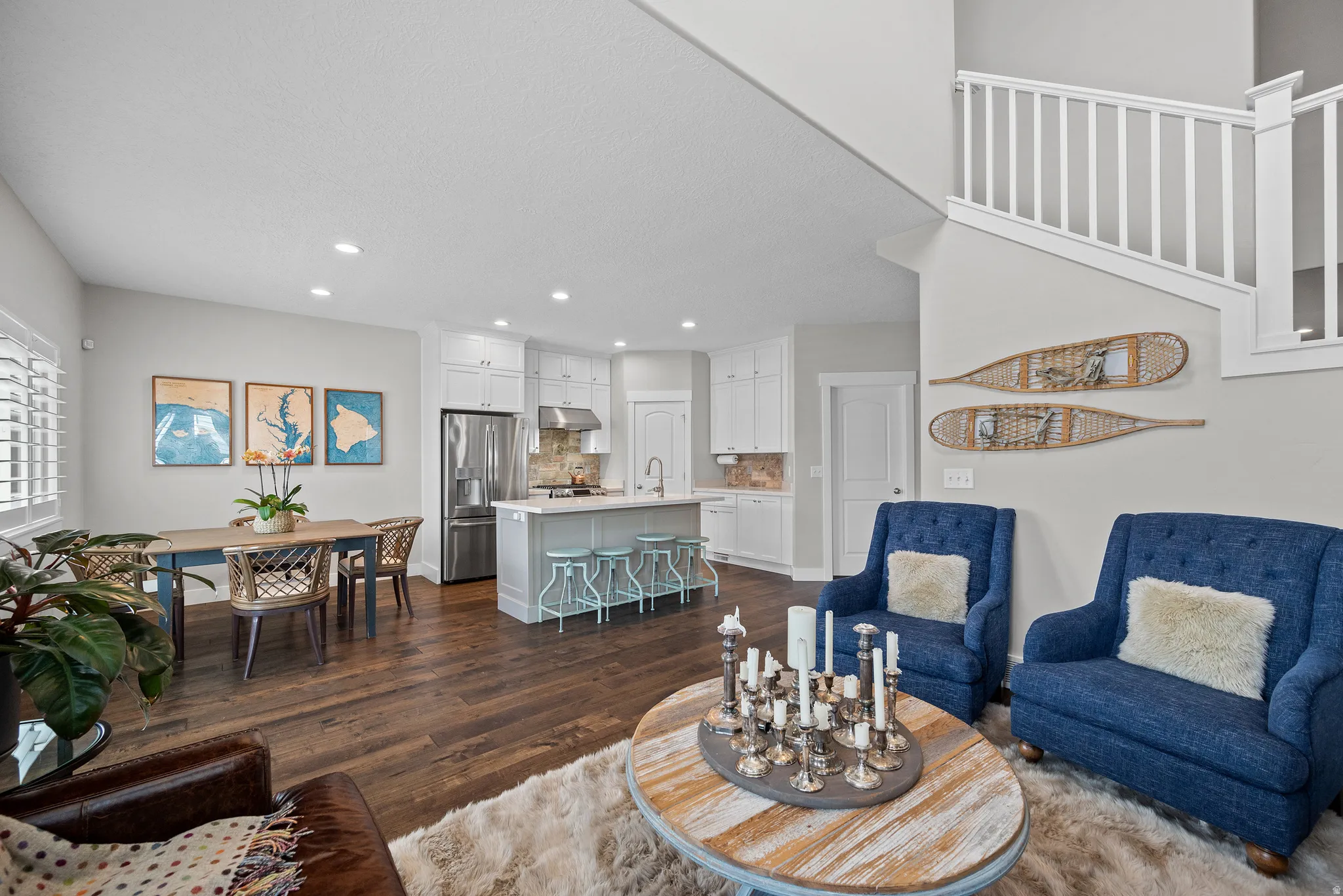 Living room featuring dark wood-type flooring and recessed lighting
