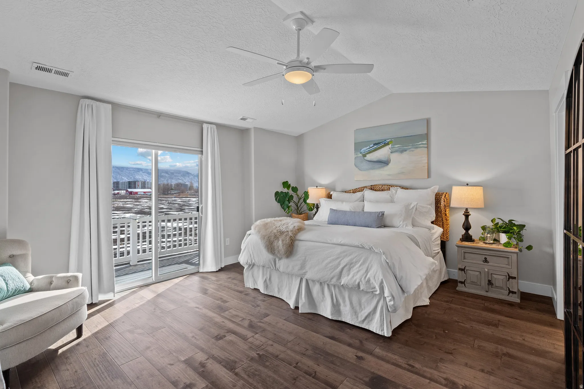 Spacious Master Suite with large ceiling fan