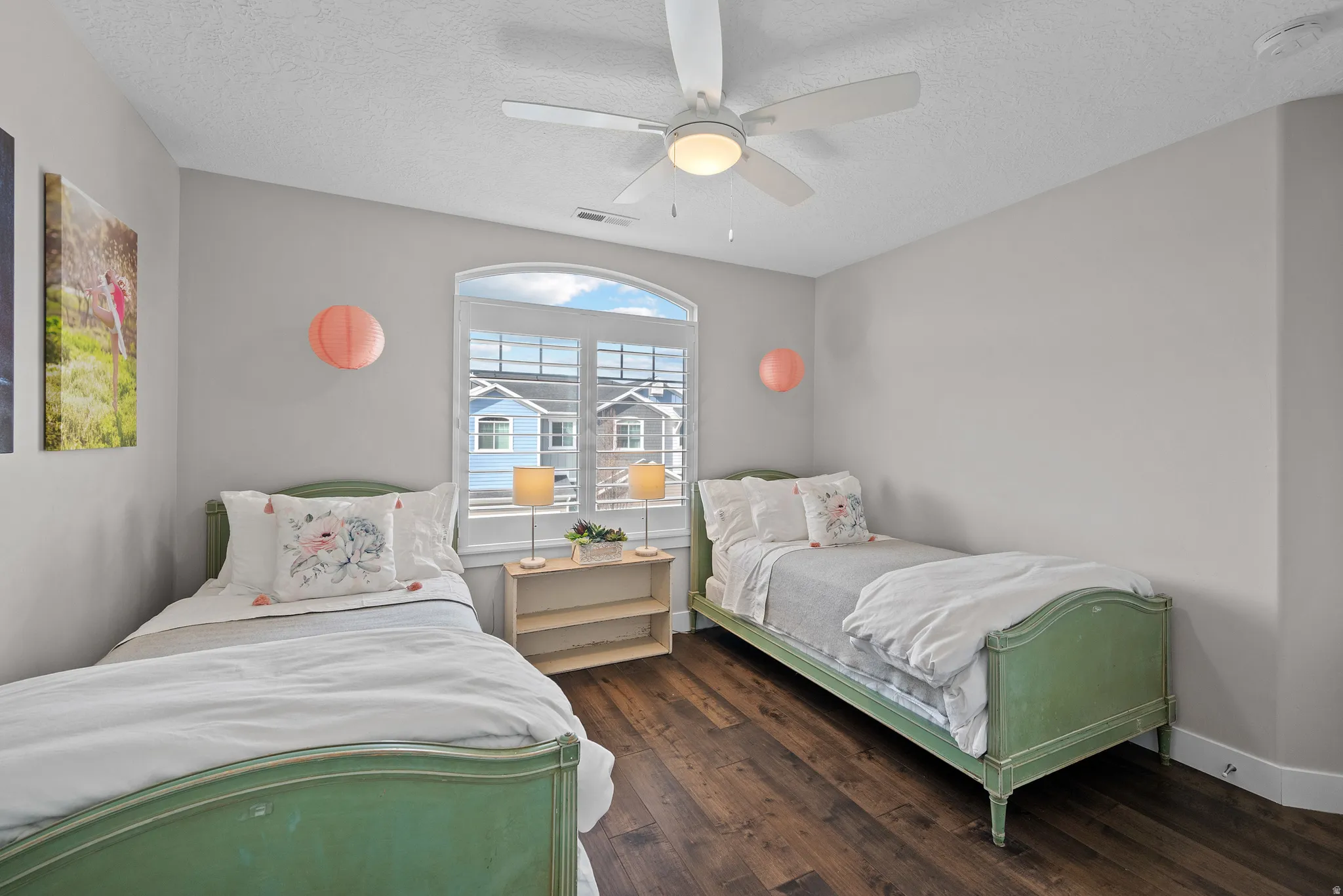 Bedroom 3, hardwood flooring, ceiling fan and custom closet builtin's.