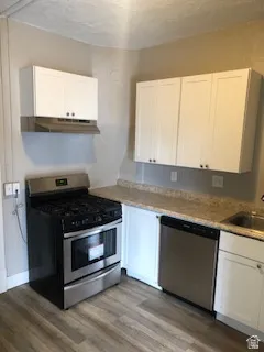 1 bedroom kitchen. It has a refrigerator
