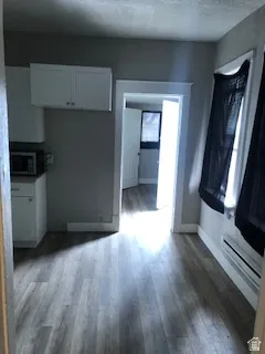1 bedroom kitchen. It has a refrigerator