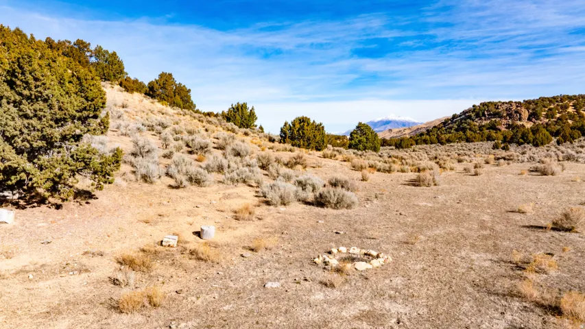 View of mountain backdrop featuring a desert landscape
