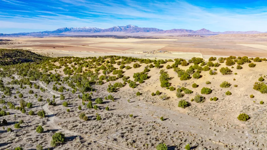 View of mountain background featuring a desert landscape and rural landscape