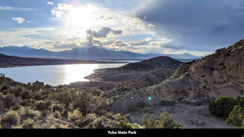 Mountain view featuring a large body of water