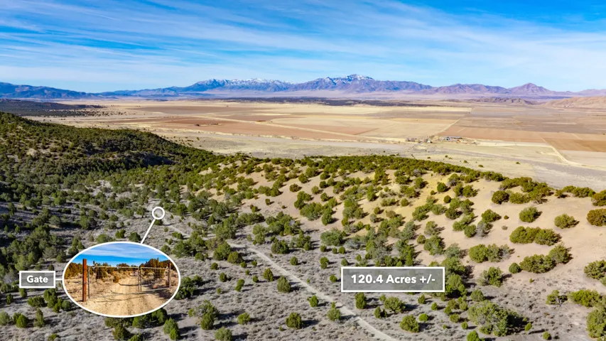 View of rural area with a desert landscape and a mountain backdrop