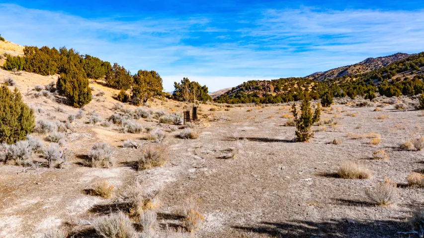 View of mountain backdrop featuring a desert landscape
