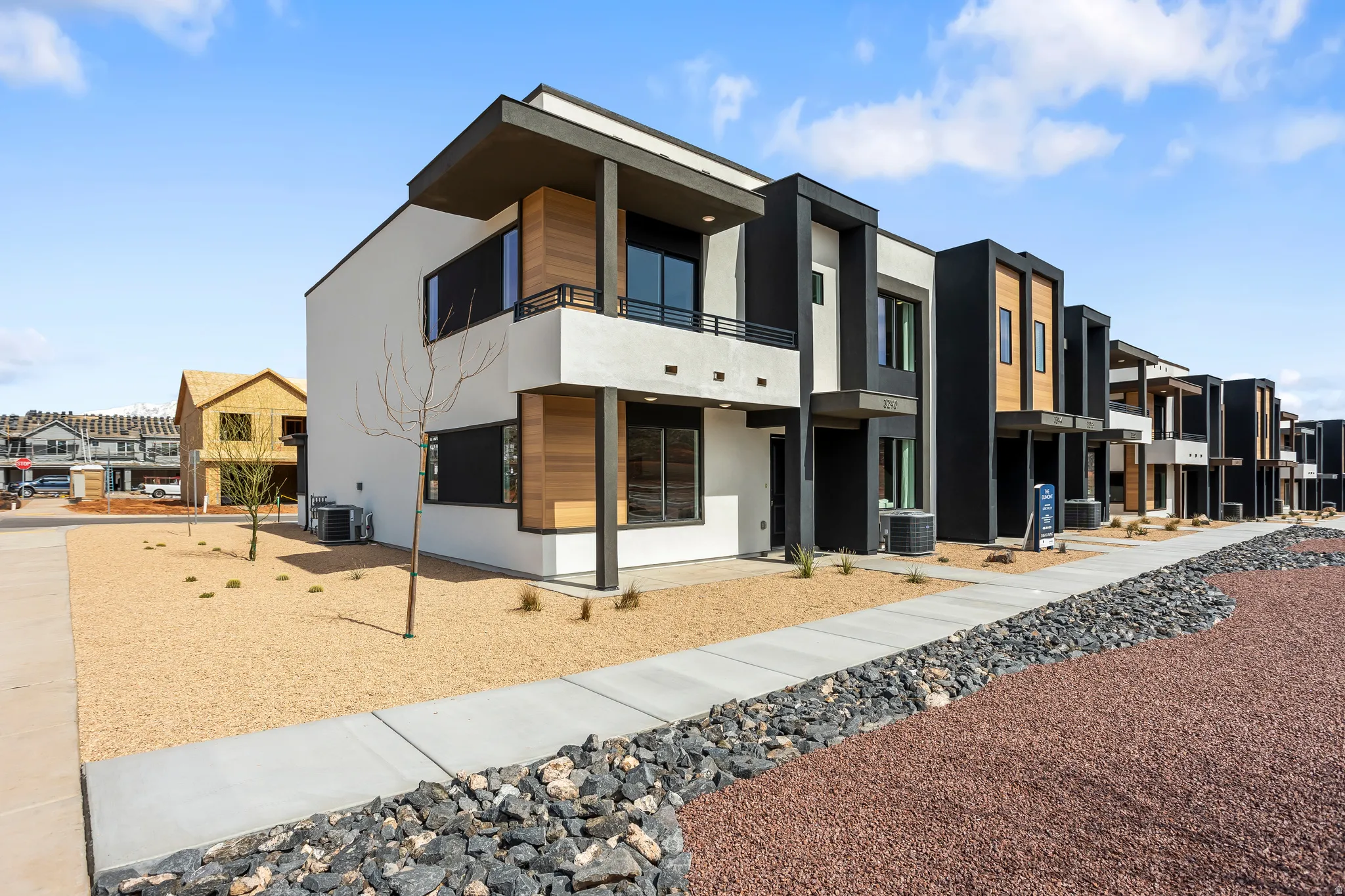 View of property with a residential view