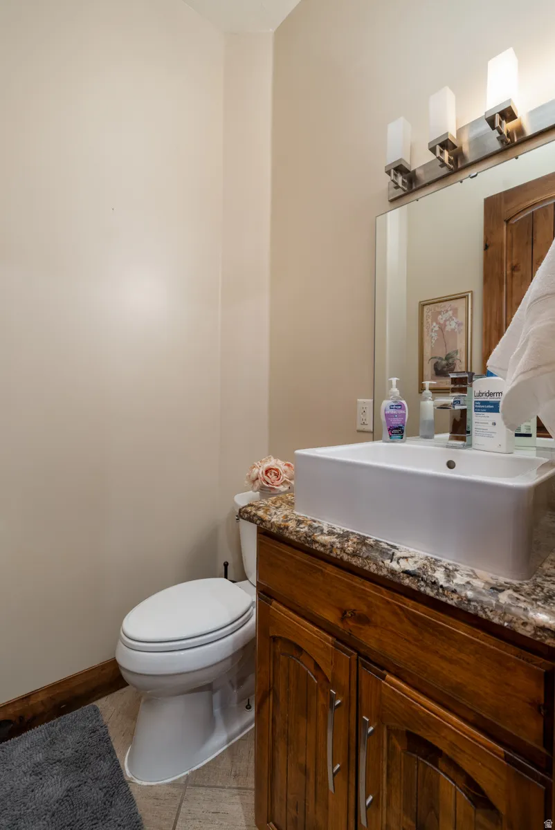 Bathroom featuring vanity and light tile patterned floors