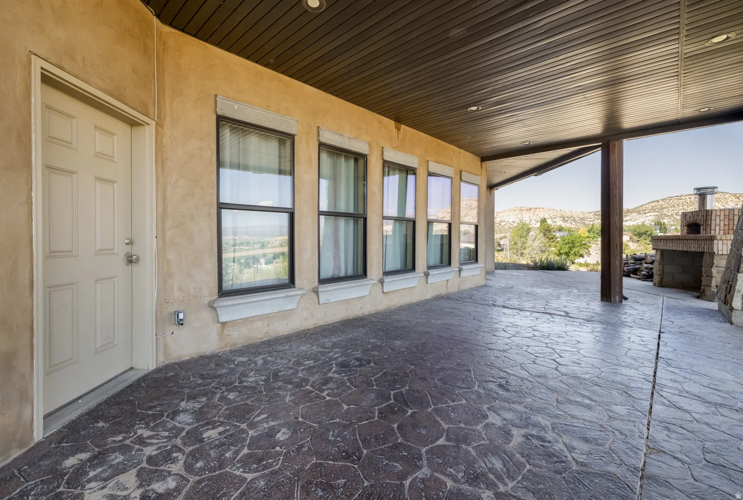 View of patio with a mountain view