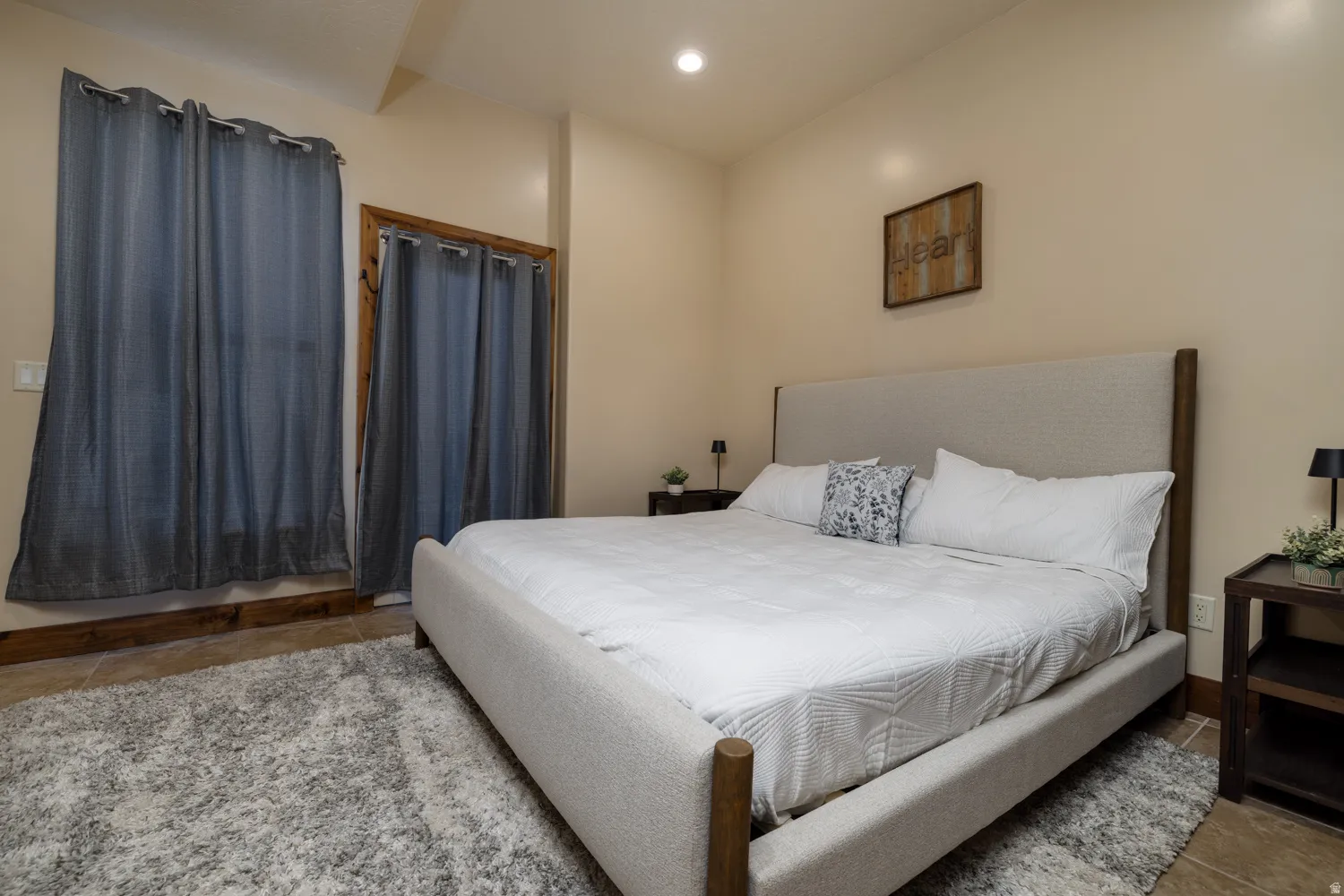 Bedroom featuring recessed lighting and tile patterned flooring