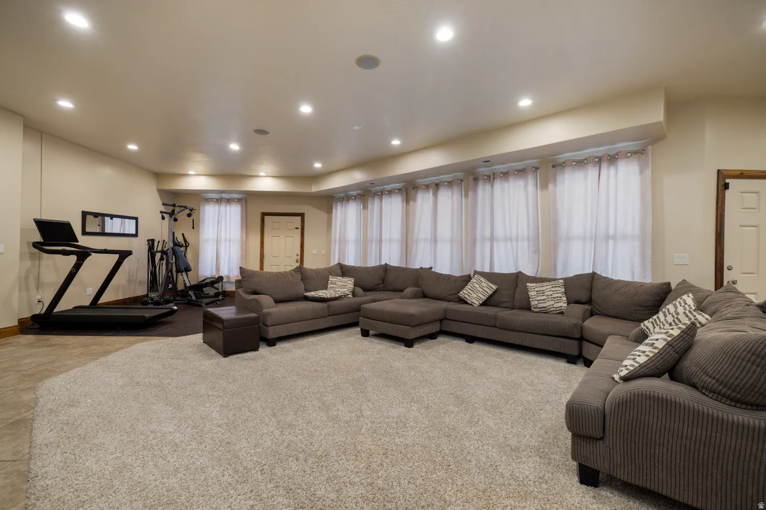 Living room featuring recessed lighting and carpet