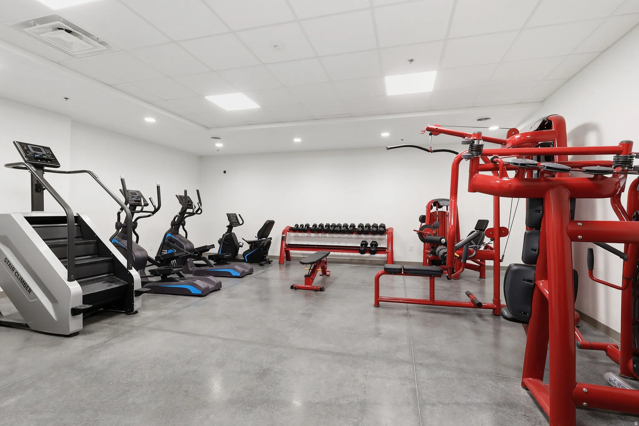 Exercise room with a paneled ceiling