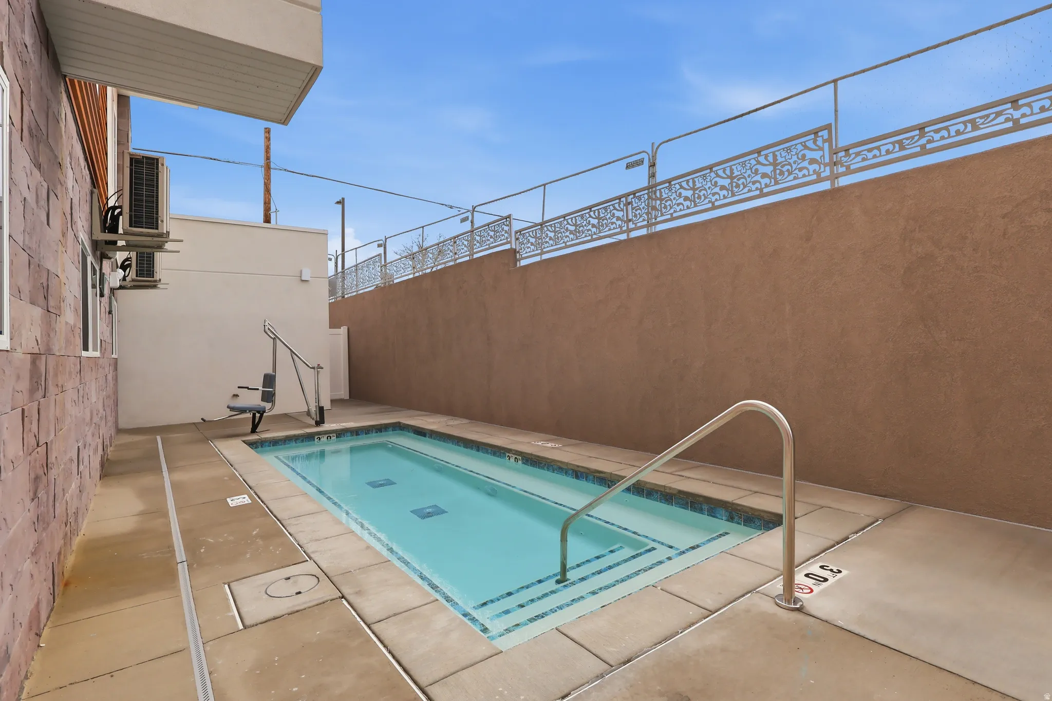View of Heated spa with patio surround.