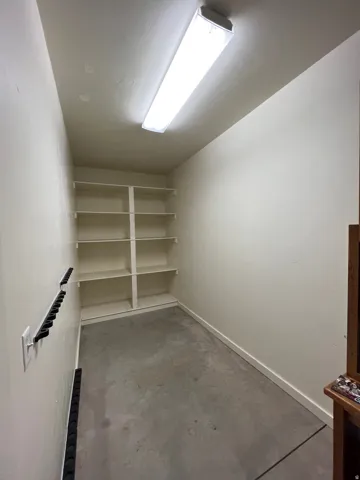 View of lockable spacious owners closet
