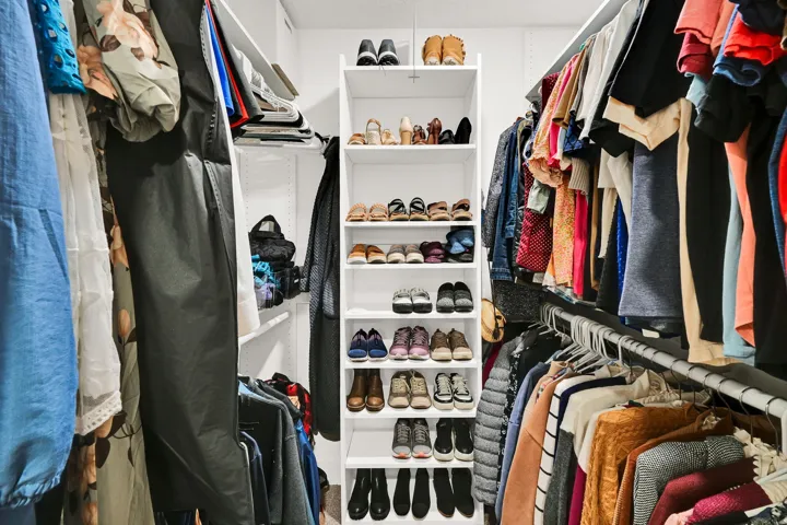 Walk in closet featuring attic access