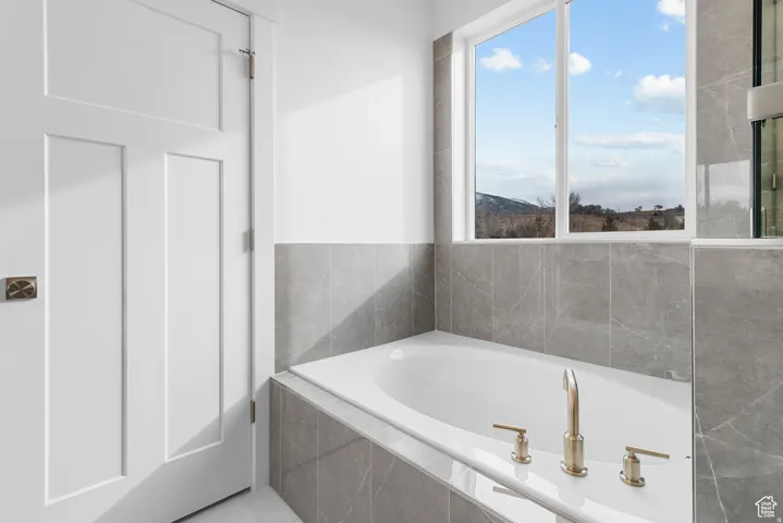 Full bath with a garden tub