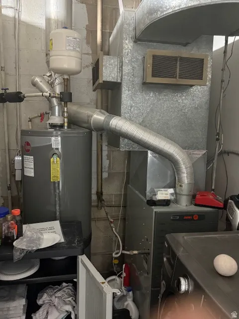 HVAC and Water Heater replaced 2024-2025 Utilities featuring electric water heater and heating unit