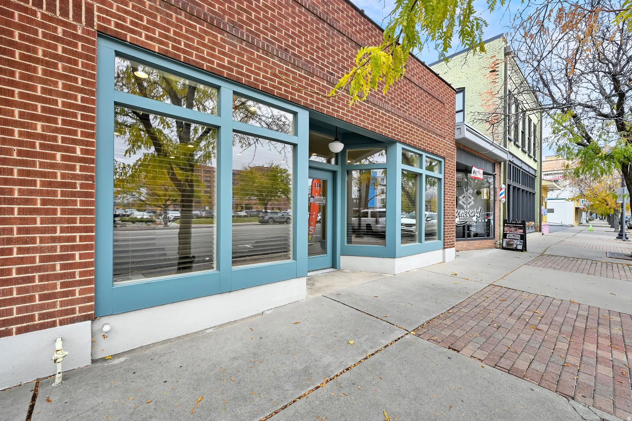 Doorway to property with brick siding