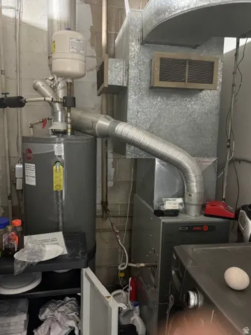 HVAC and Water Heater replaced 2024-2025 Utilities featuring electric water heater and heating unit