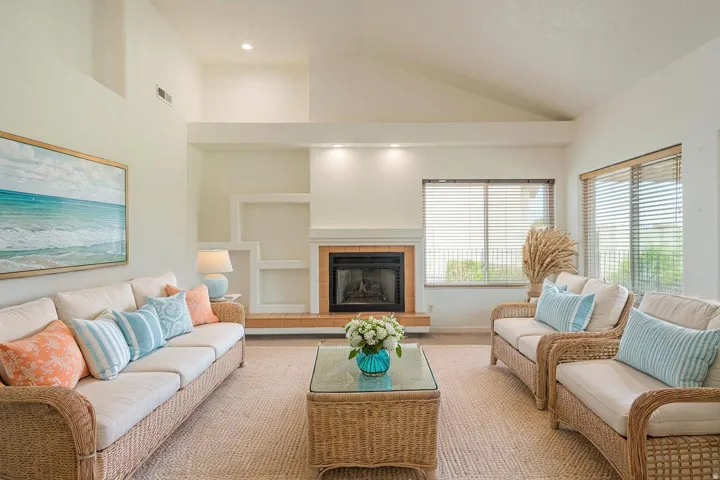 Sitting high above the Southgate golf course this home has a beautiful and bright living area with built in shelves, lofted ceiling, and a fireplace