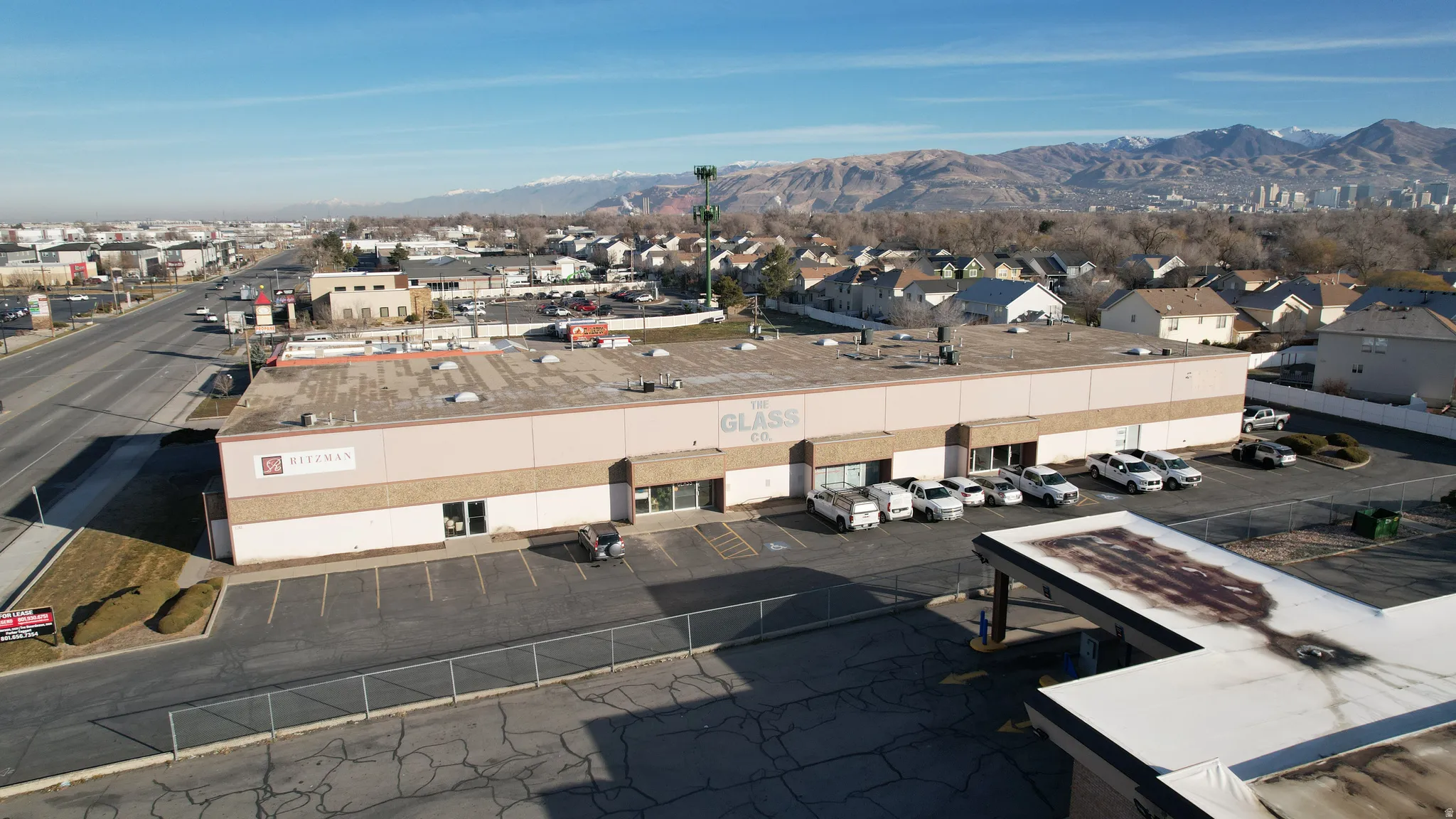 Bird's eye view of mountains and a commercial area