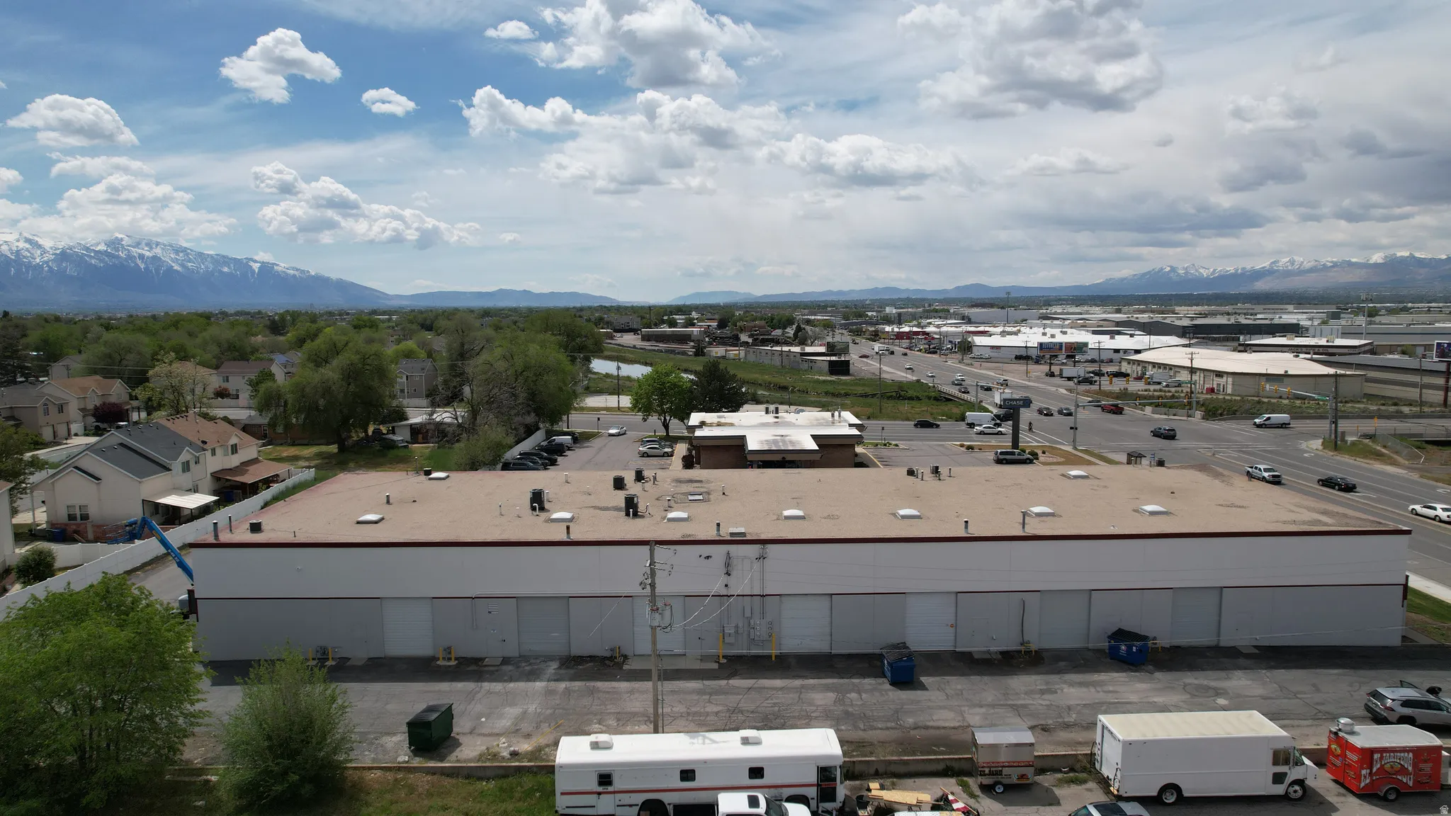 Commercial building with a flat roof and multiple loading dock doors