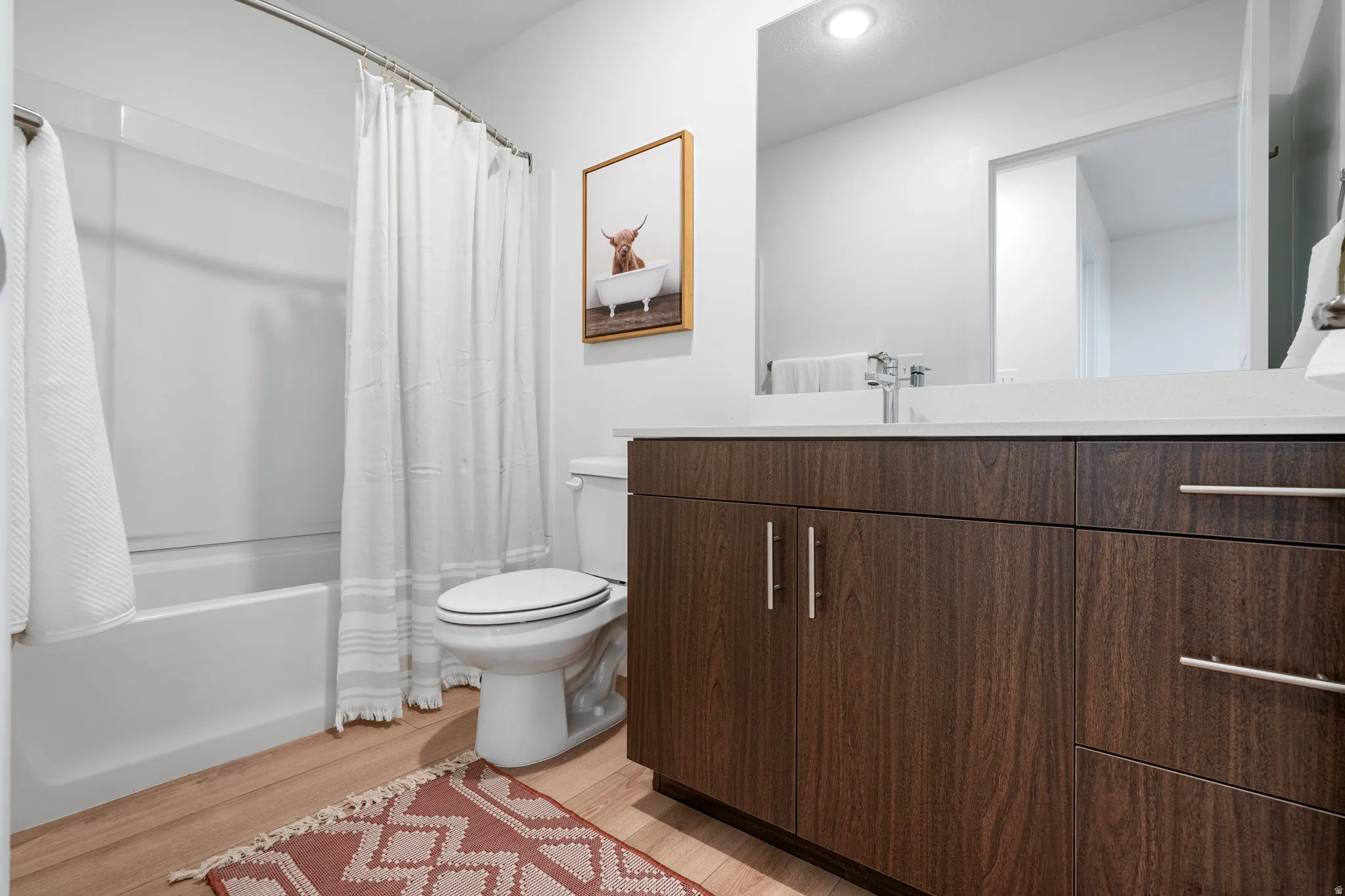 Full Upstairs bathroom is perfect for guests! *Color to be midtone cabinets.