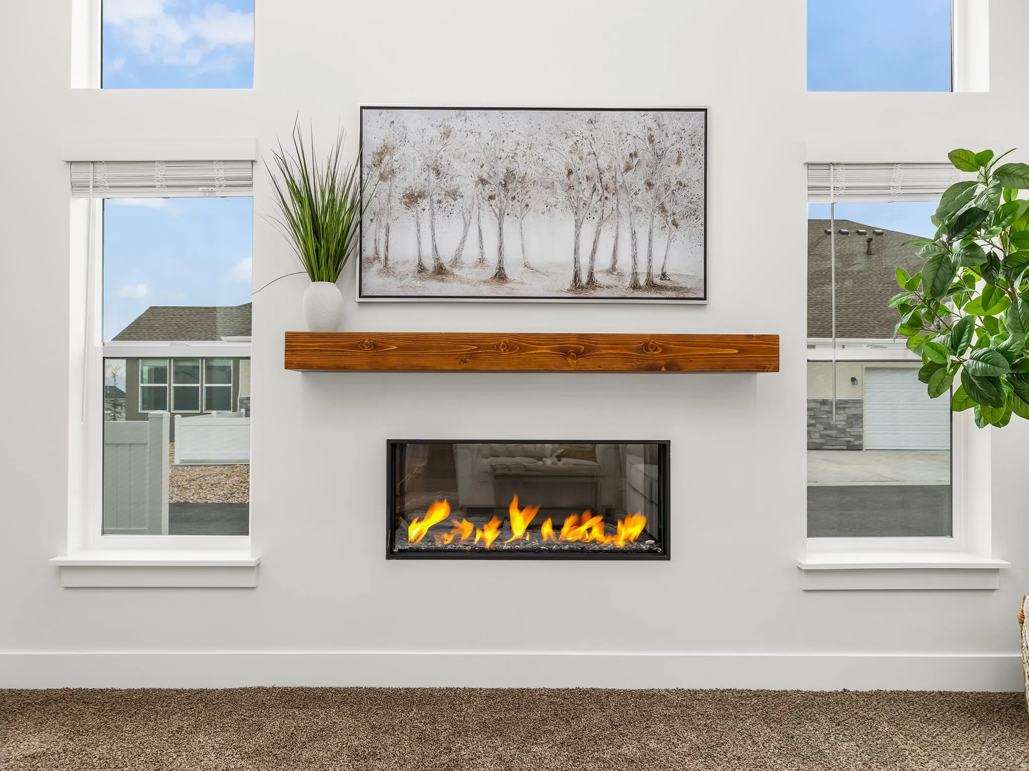 Great room with vaulted ceilings and cozy fireplace.