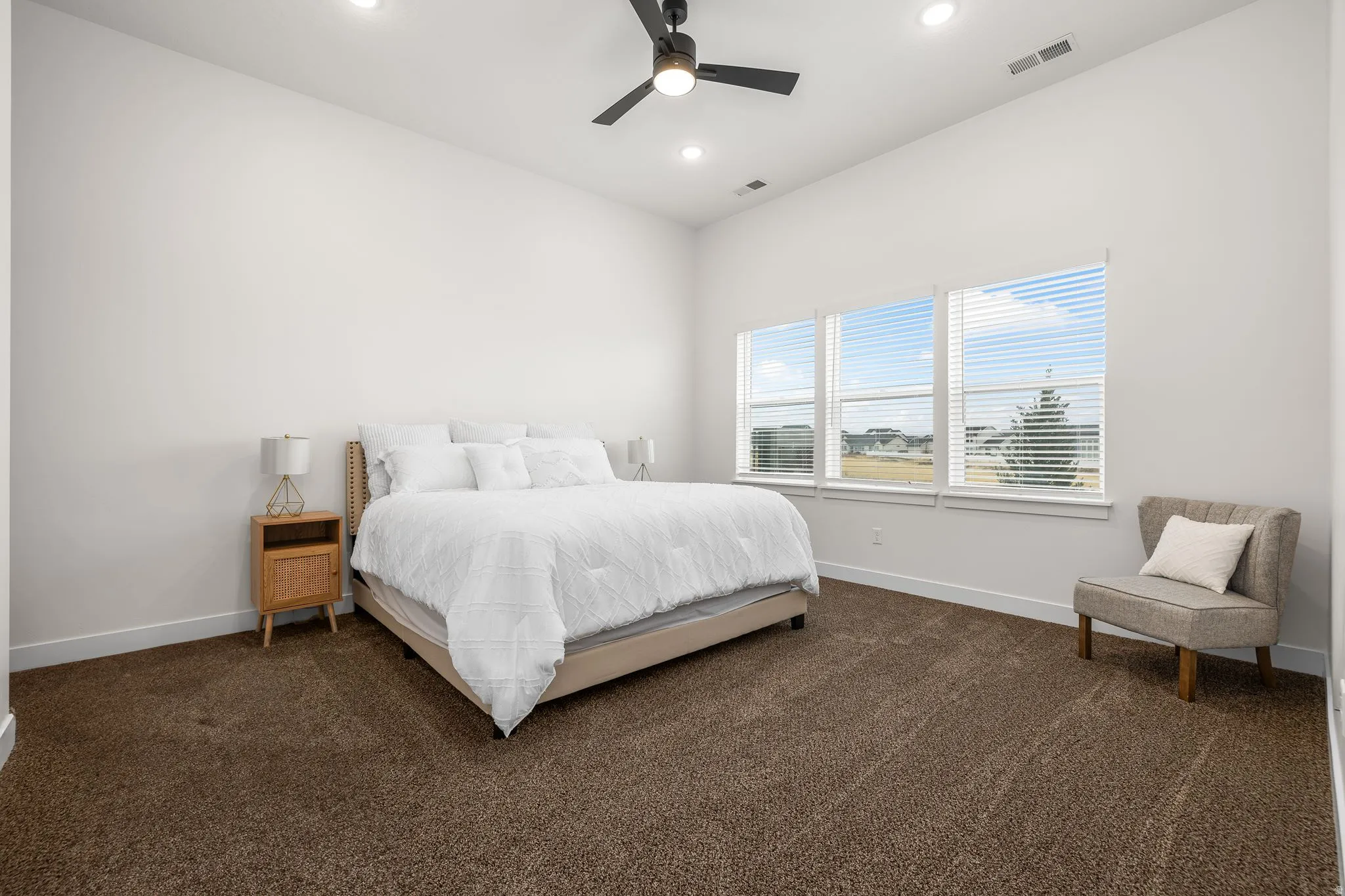 Primary suite with walk in closet and en' suite bath.