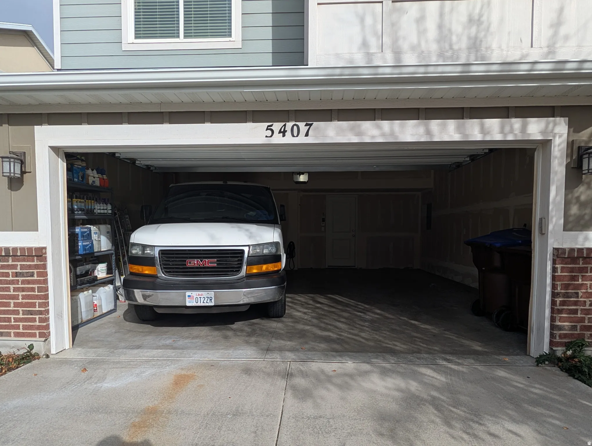Garage with concrete driveway