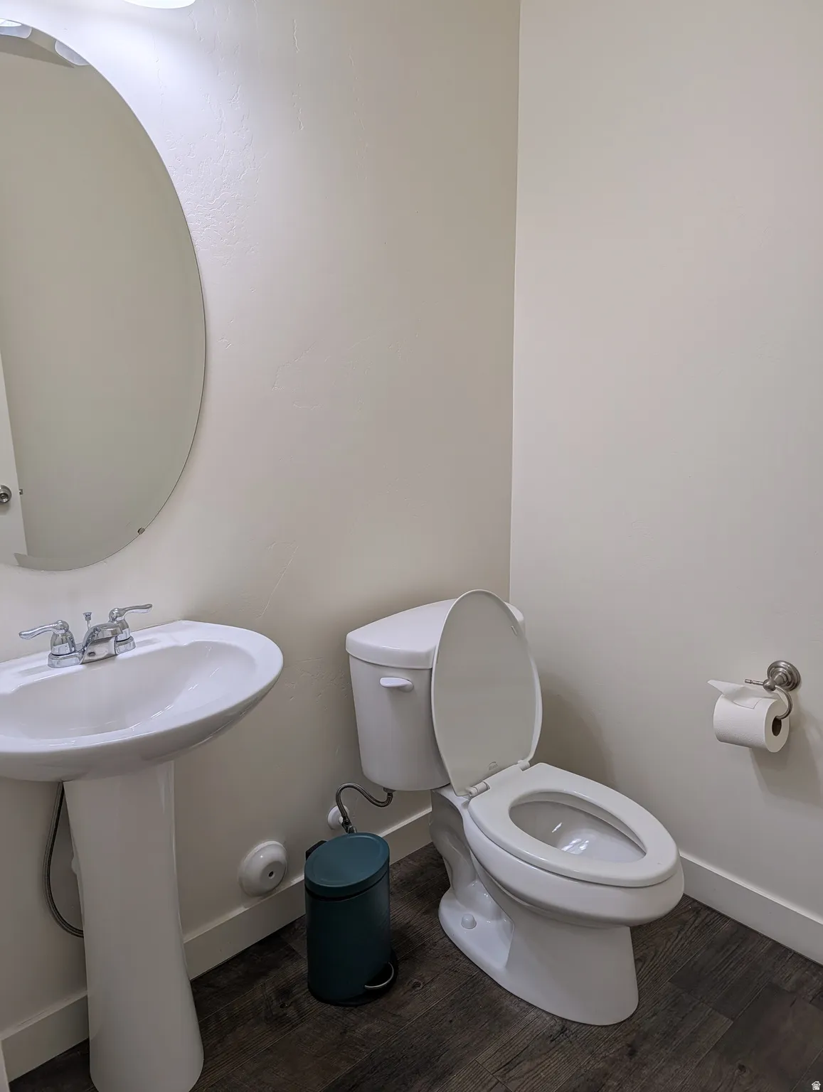 Bathroom with dark wood-style flooring