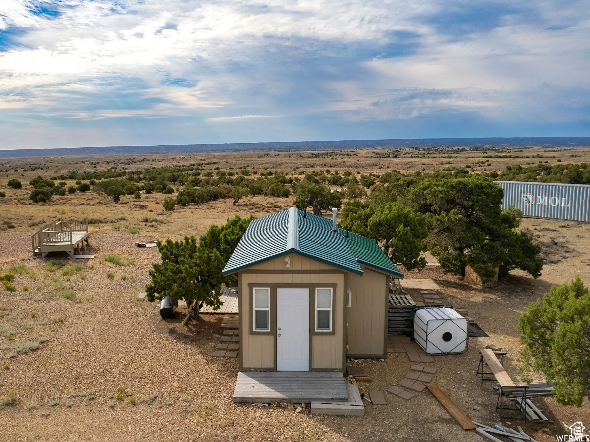 View of shed featuring a view of rural / pastoral area and view of desert landscape