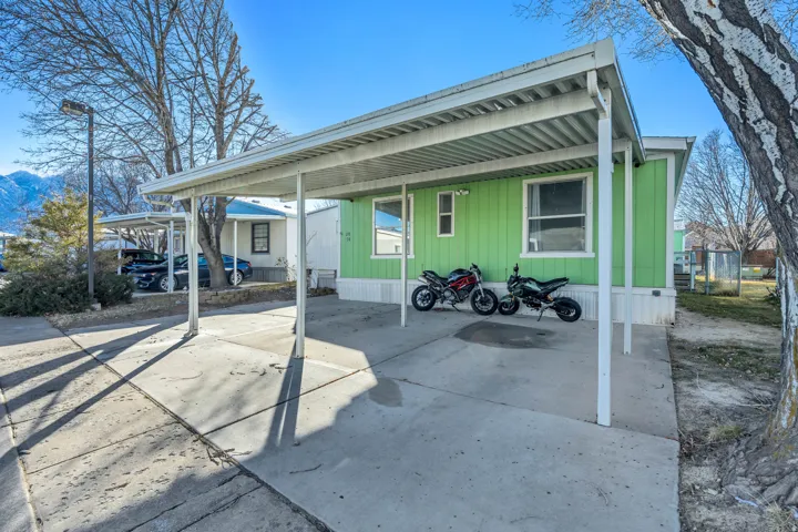 View of patio with an attached carport