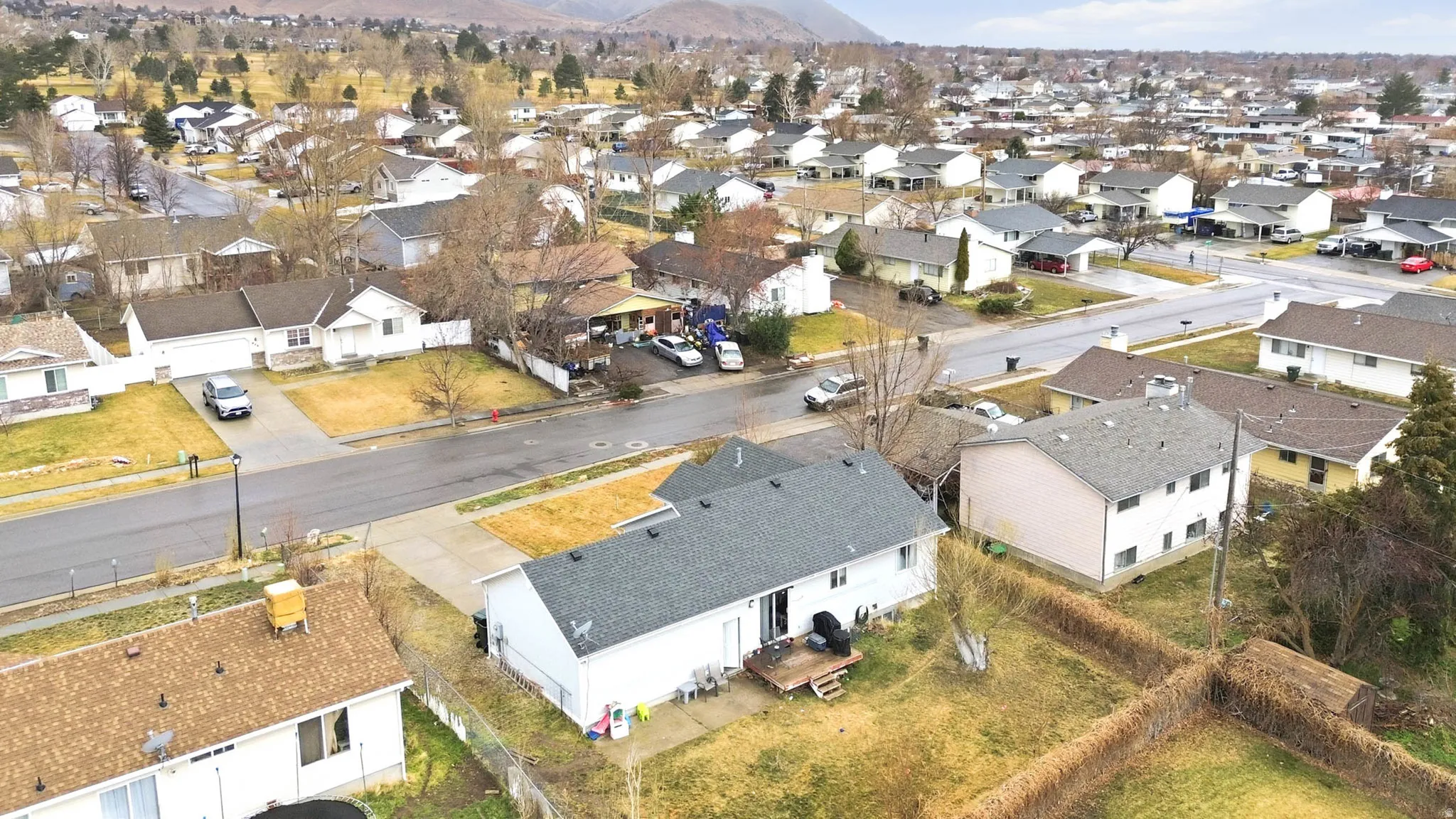 Aerial perspective of suburban area featuring mountains