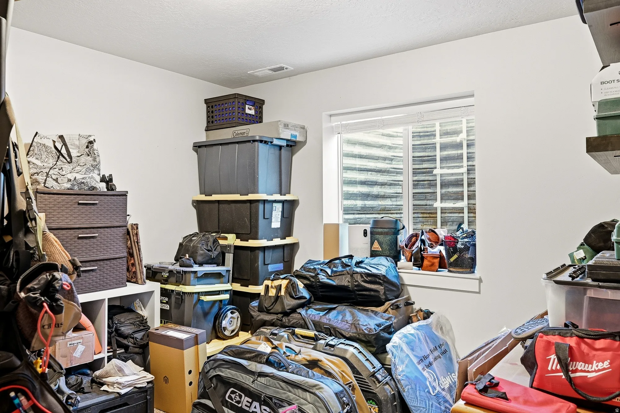 Misc room with a textured ceiling