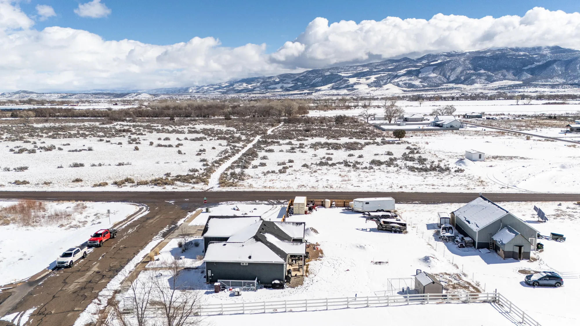 Snowy aerial view with a mountain view