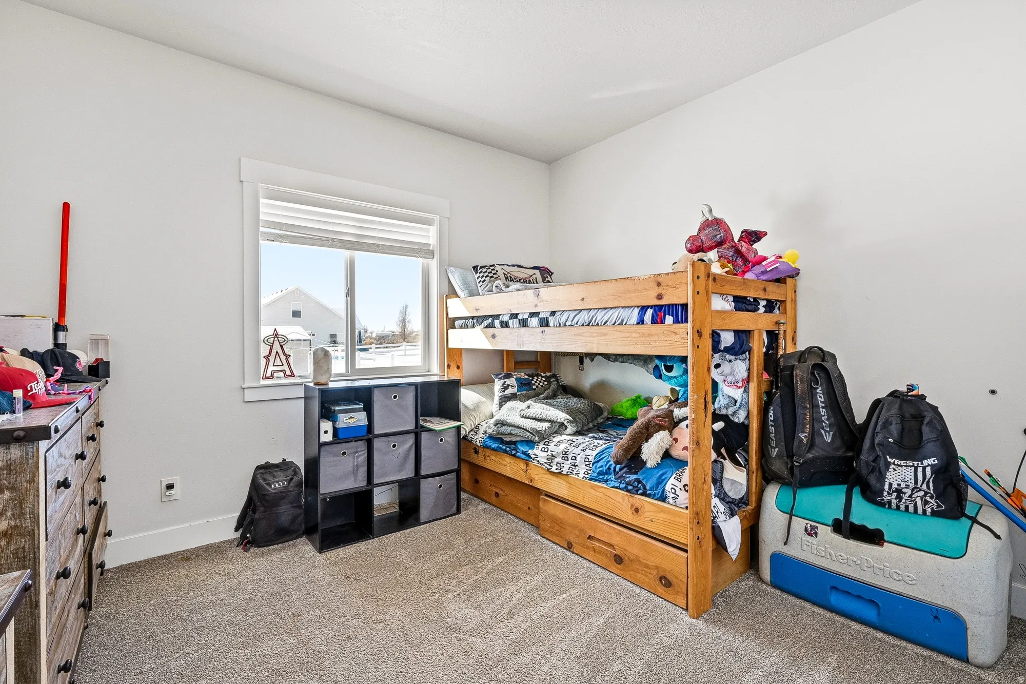 Carpeted bedroom with baseboards
