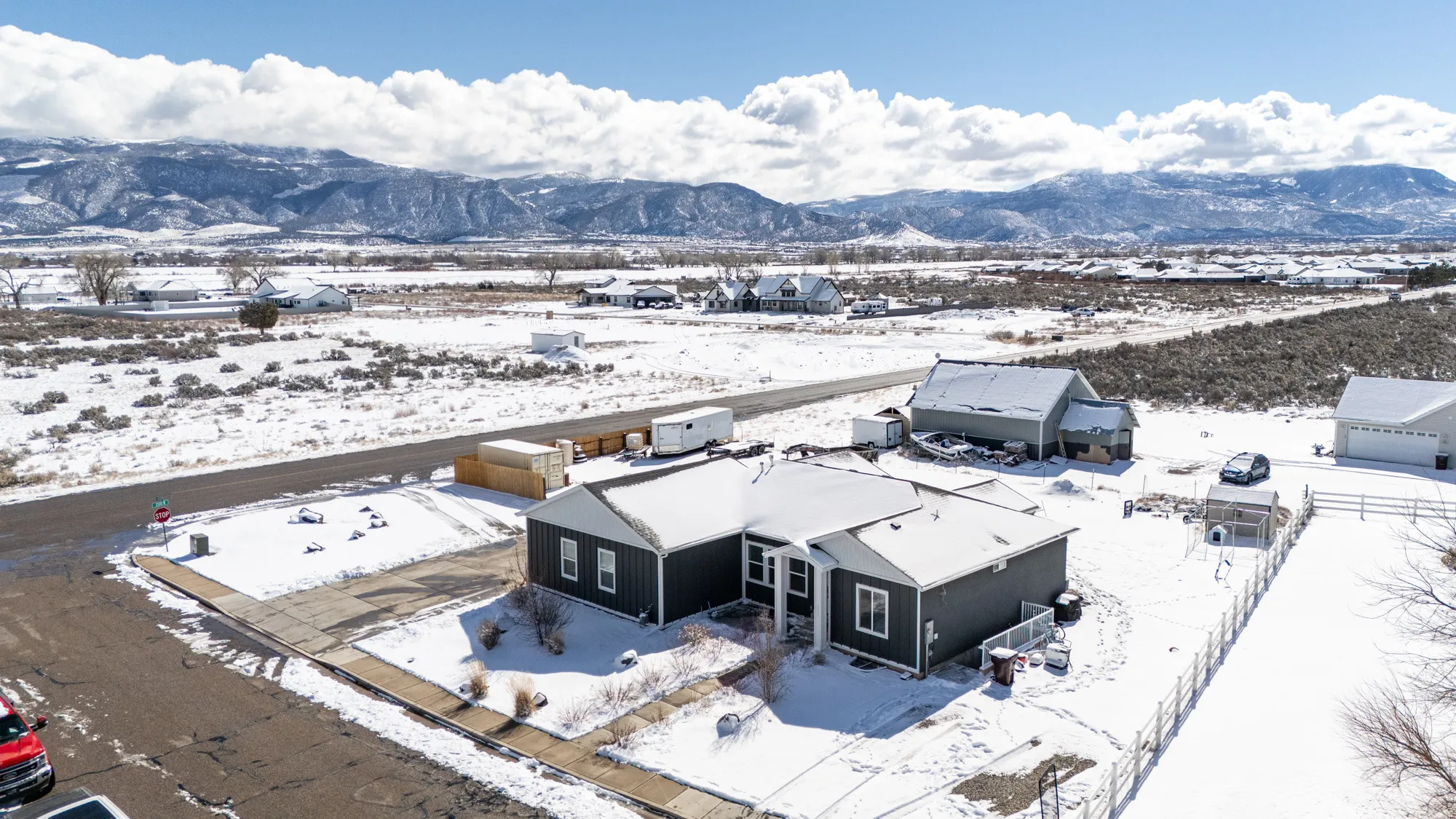 Snowy aerial view with a mountain view