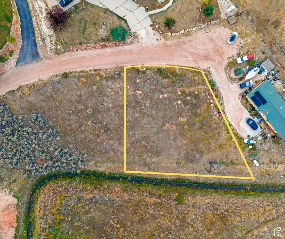 Aerial overview of property's location featuring property parcel outlined