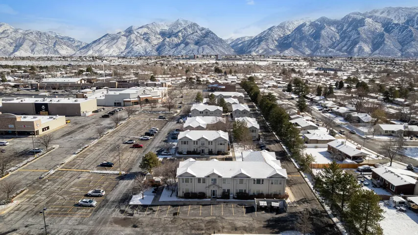 Aerial view of residential area with a mountainous background