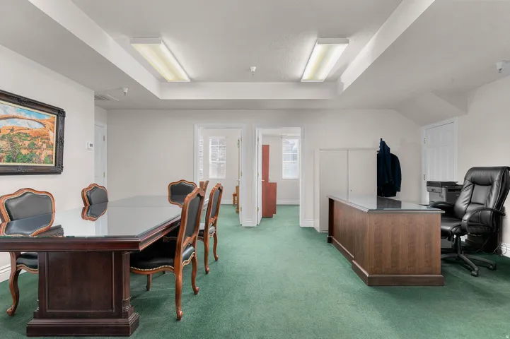 Office area with a tray ceiling