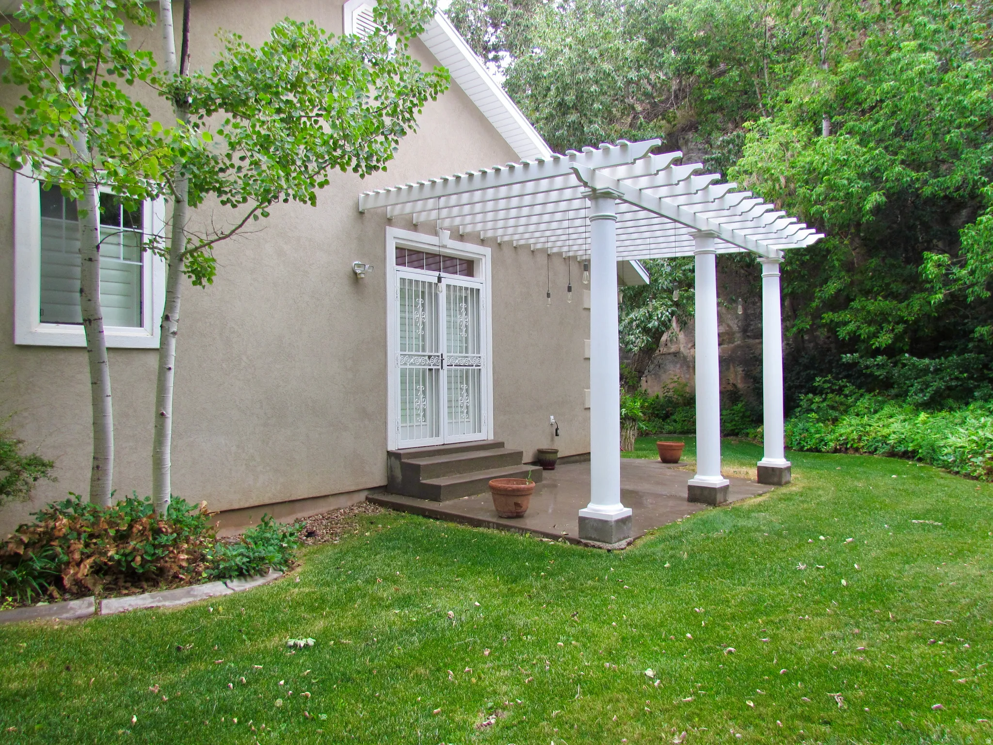 Private patio off of primary bedroom