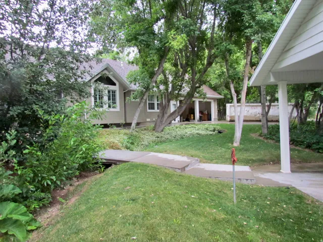 Side view with 2 car attached garage