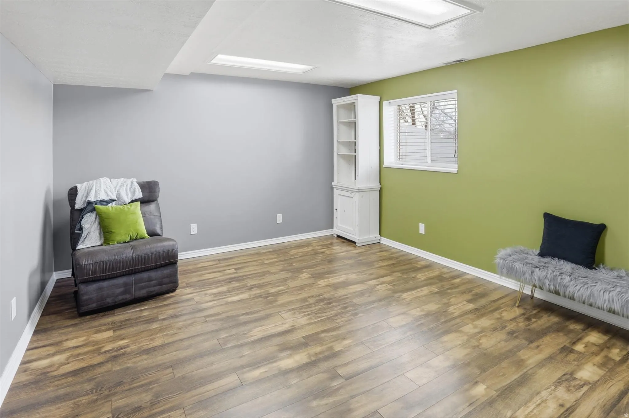Living area featuring dark wood finished floors
