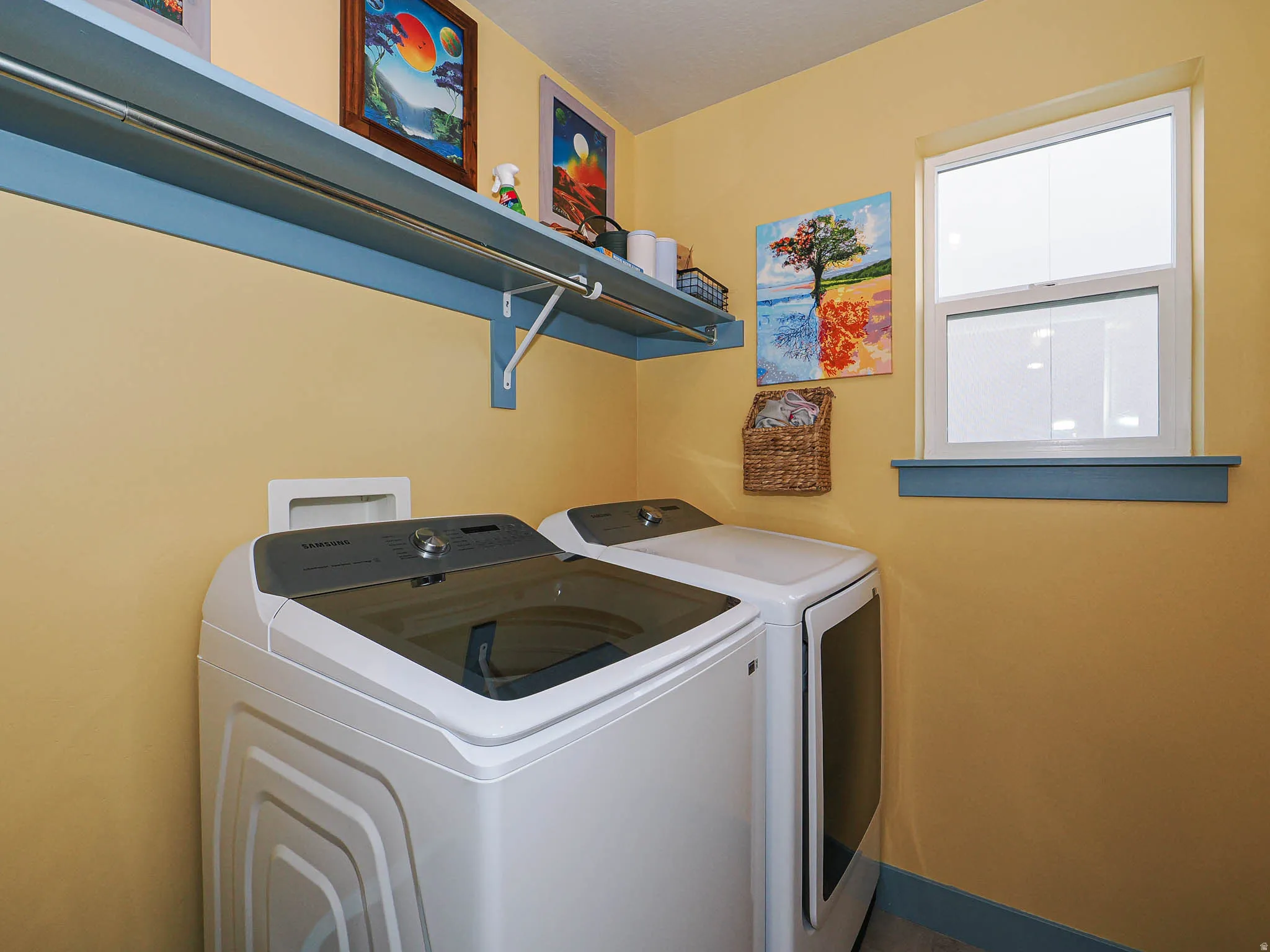 Laundry area featuring independent washer and dryer