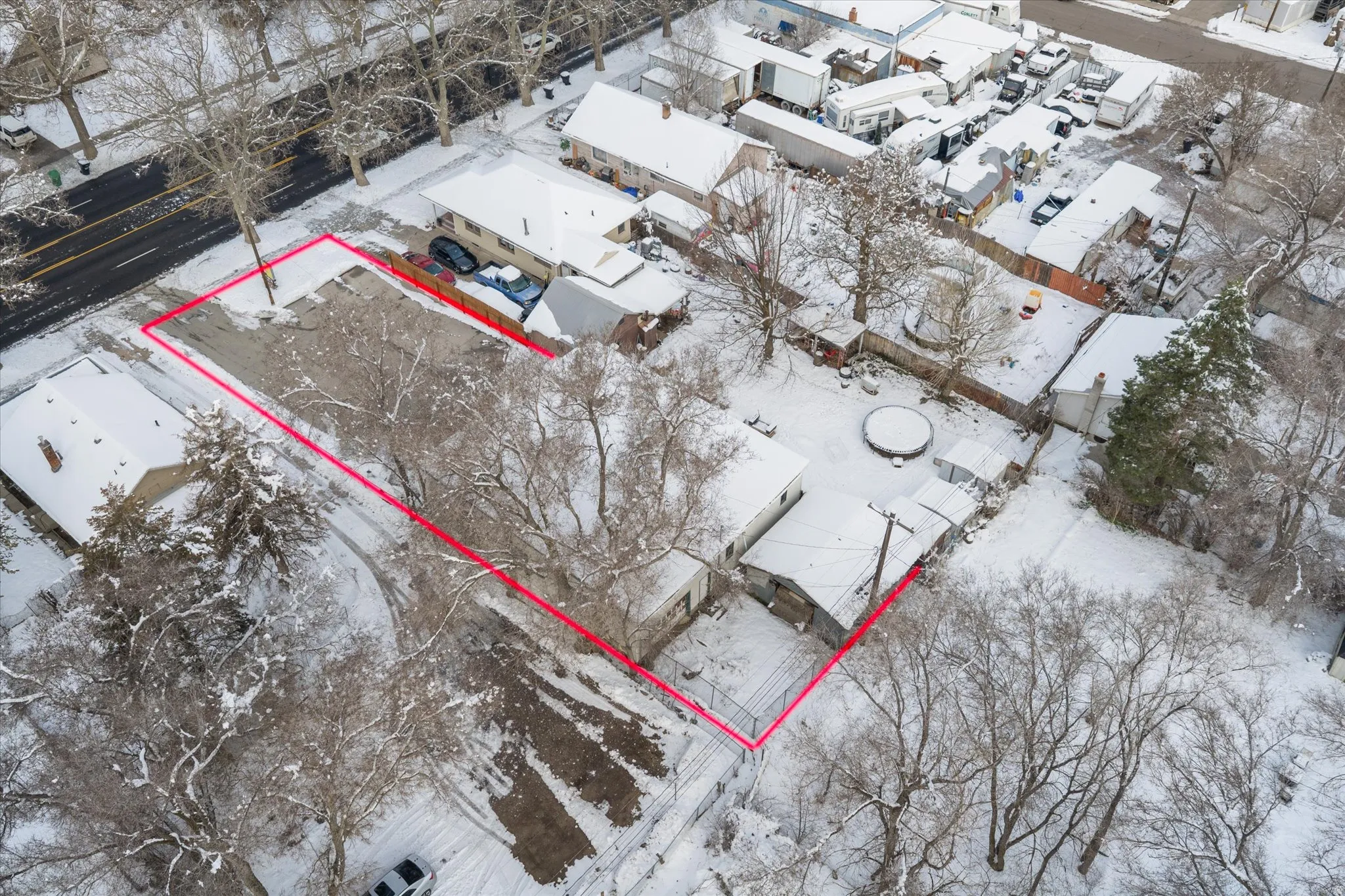 Aerial view featuring property parcel outlined featuring backyard and shop area