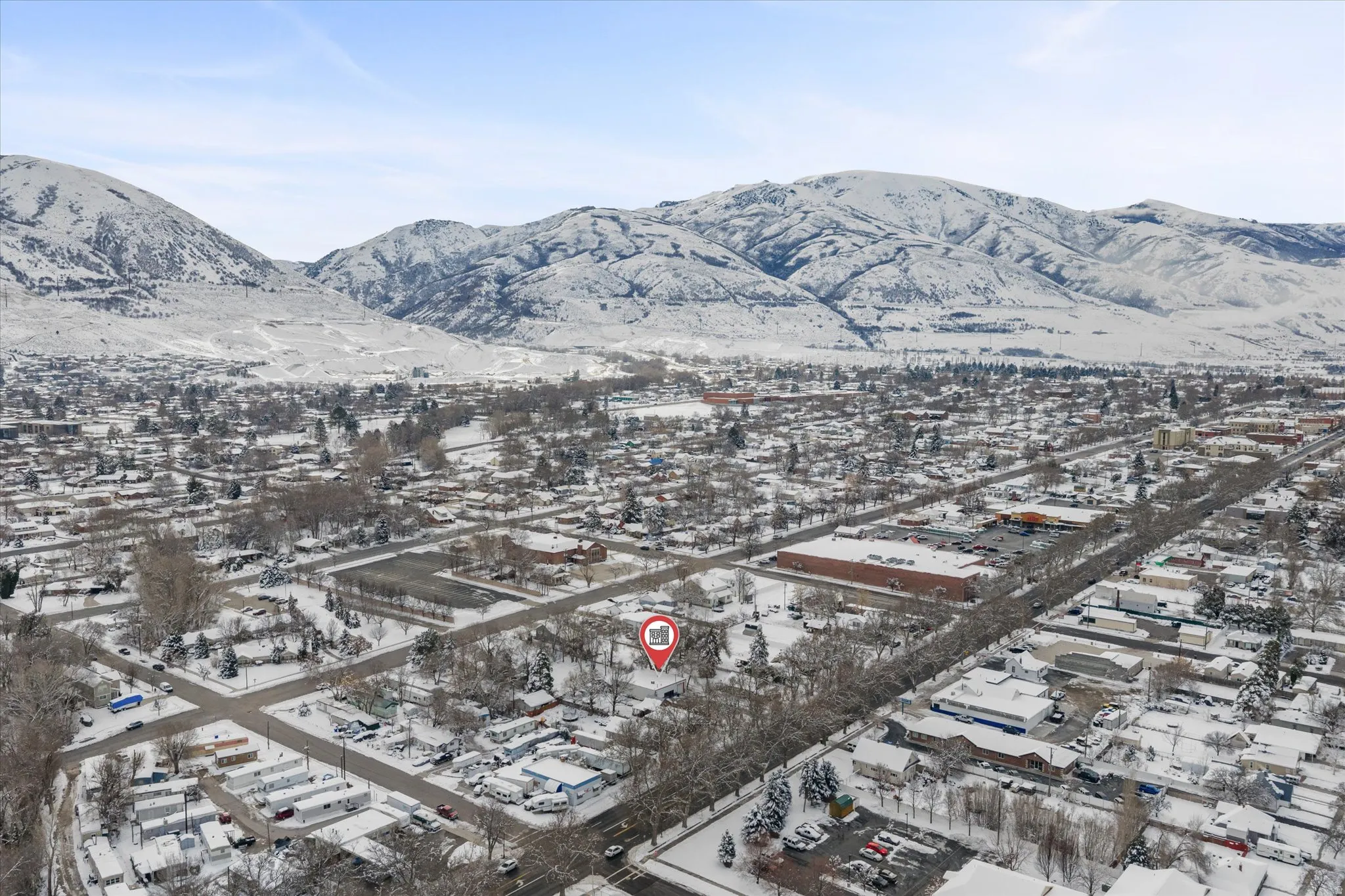 Aerial view featuring a mountain view and Main Street