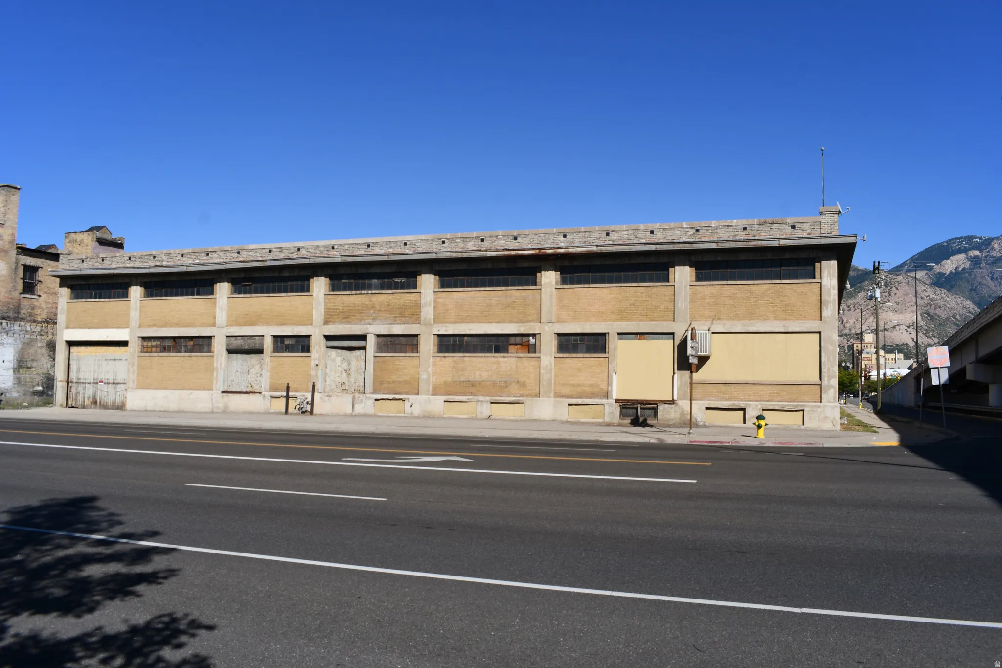 View of property with a mountain view