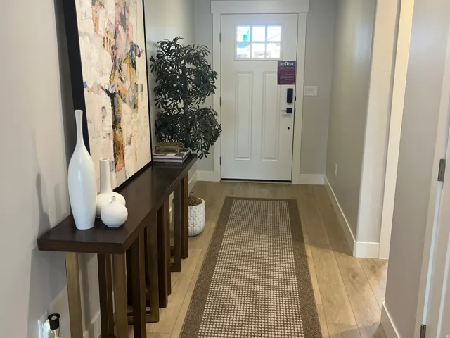 Entryway featuring light wood finished floors and baseboards